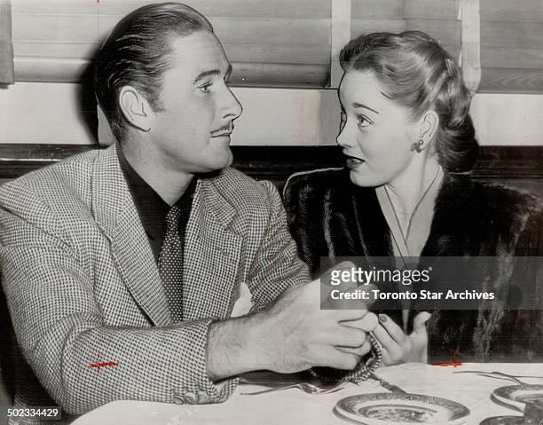 Dinner together is enjoyed; apparently; by Errol Flynn and his wife; Nora Eddington in a Holloywood cafe. Later that evening they went to attend the...