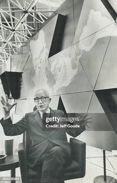 Buckminster Fuller; 78; the innovative architect-engineer-writer; sits in front of a model of his geodesic dome at the Ontario Science Centre; where...