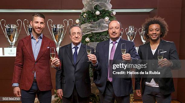 Sergio Ramos, president Florentino Perez, head coach Rafael Benitez and Marcelo Vieira pose during a Real Madrid Christmas portrait session at...