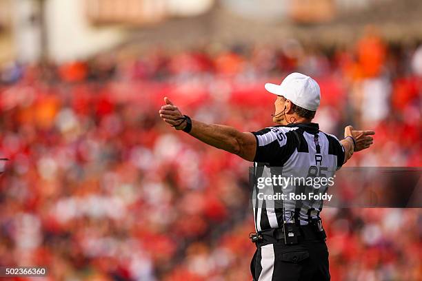 Referee Ed Hochuli gestures during the game between the Tampa Bay Buccaneers and the Atlanta Falcons at Raymond James Stadium on December 6, 2015 in...