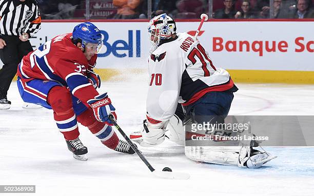 Brian Flynn of the Montreal Canadiens scores a goal against Braden Holtby of the Washington Capitals in the NHL game at the Bell Centre on December...