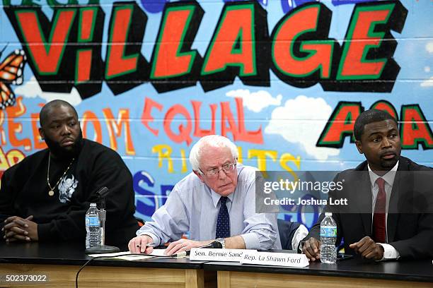 Rapper Killer Mike, left, and State Representative La Shawn Ford , right, listen as Democratic presidential candidate U.S. Senator Bernie Sanders,...