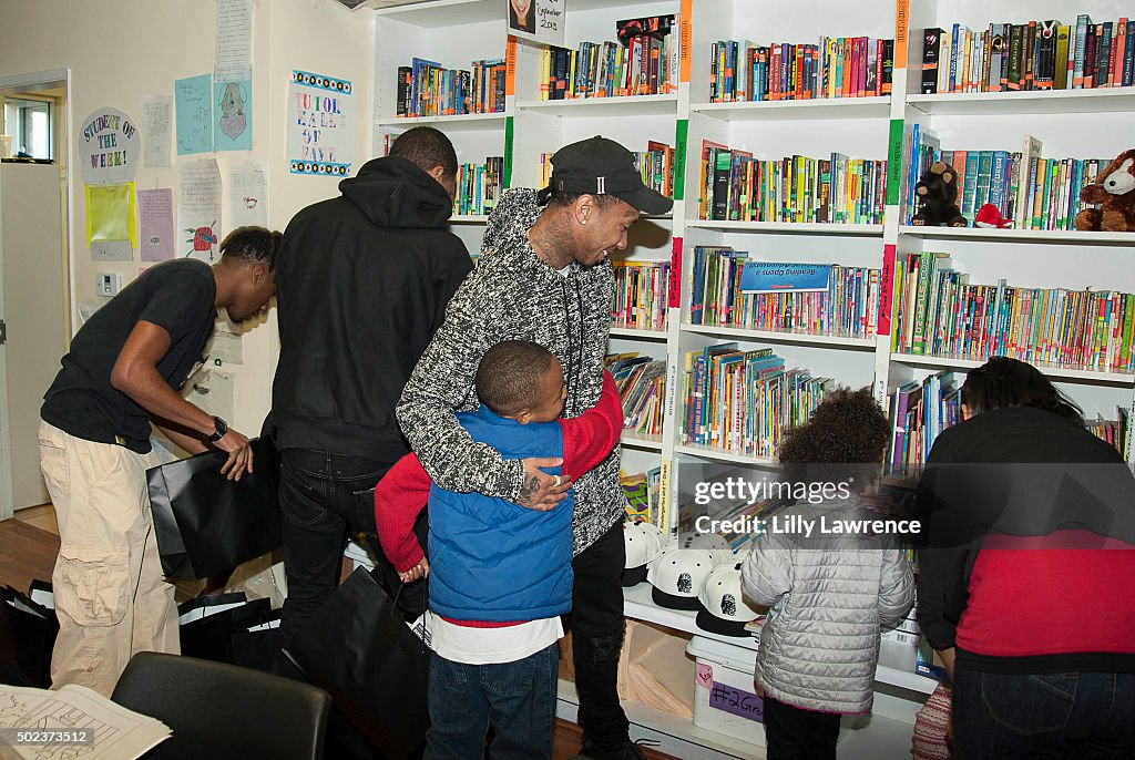 Tyga Presents Surprise Holiday Party To School On Wheels Children At Skid Row Learning Center