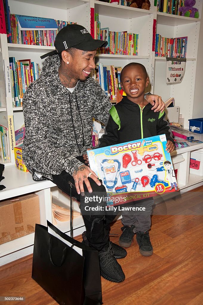 Tyga Presents Surprise Holiday Party To School On Wheels Children At Skid Row Learning Center