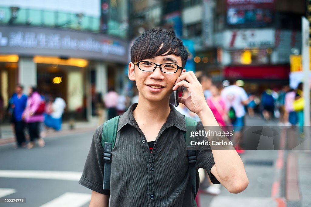 Boy talking on cell phone