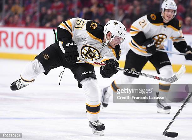 Ryan Spooner of the Boston Bruins takes a shot against the Montreal Canadiens in the NHL game at the Bell Centre on December 9, 2015 in Montreal,...