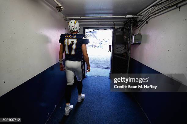 Philip Rivers of the San Diego Chargers walks through a tunnel turnover enter the field prior to a game against Miami Dolphins at Qualcomm Stadium on...