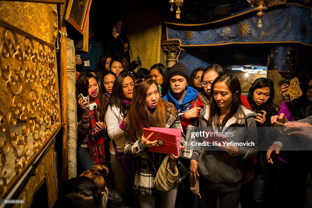 Christian Pilgrims Visit The Church Of Nativity In Bethlehem