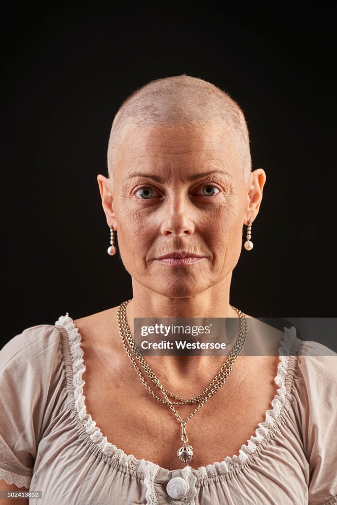 Bald woman in chemotherapy fighting cancer