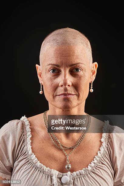 bald woman in chemotherapy fighting cancer - cancer portrait stock pictures, royalty-free photos & images