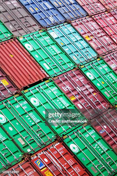 cargo containers - shipping containers green red stock pictures, royalty-free photos & images