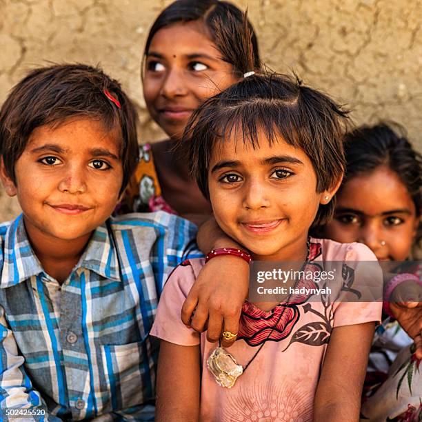 group of happy indian children, desert village, india - gypsy stock pictures, royalty-free photos & images