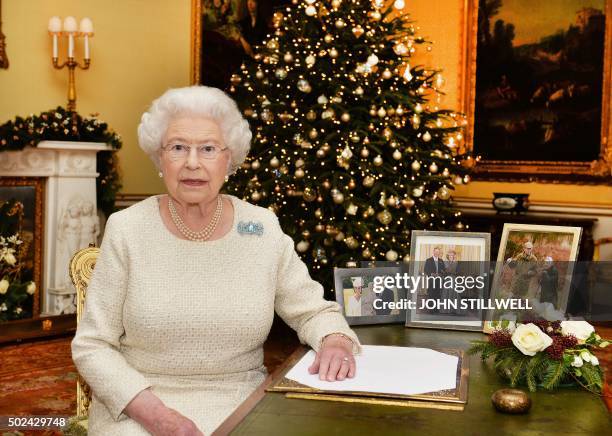 Britain's Queen Elizabeth II is pictured after recording her Chistmas Day broadcast to the Commonwealth in the 18th Century Room at Buckingham Palace...