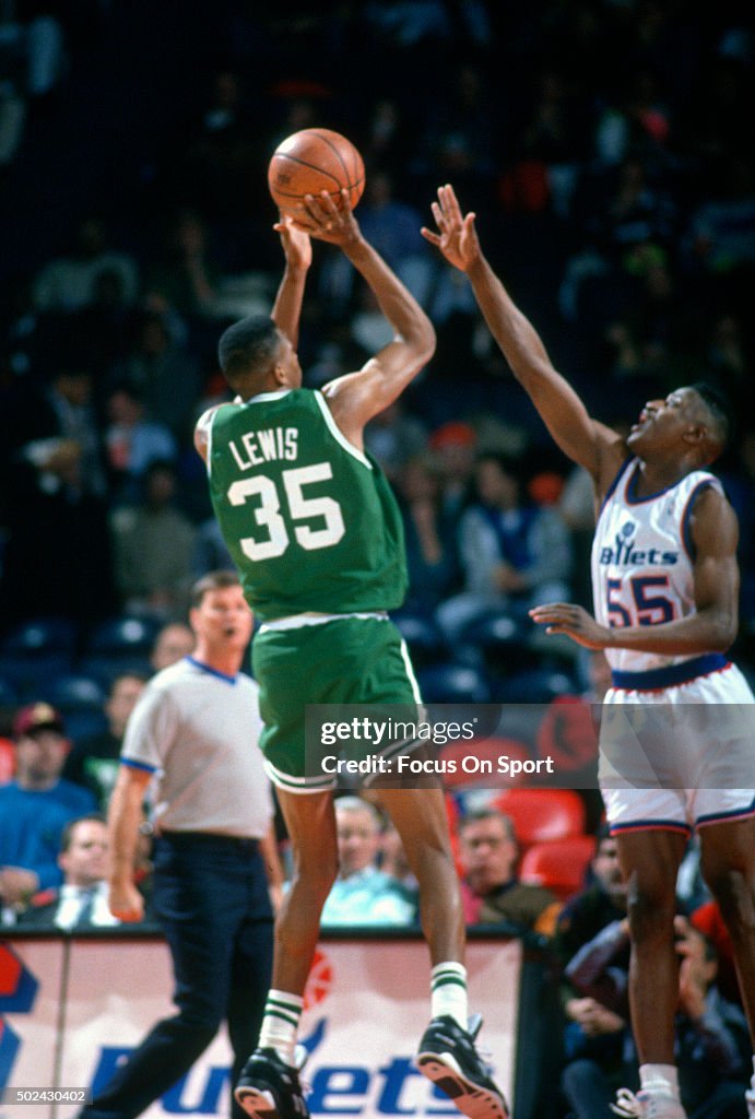 Reggie Lewis Reggie Lewis of the Boston Celtics shoots over David Wingate of the ...