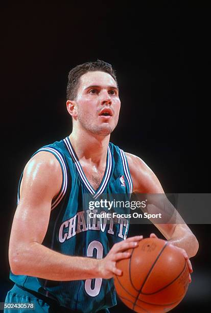 Rex Chapman of the Charlotte Hornets looks to shoot a free throw against the Washington Bullets during an NBA basketball game circa 1991 at the...