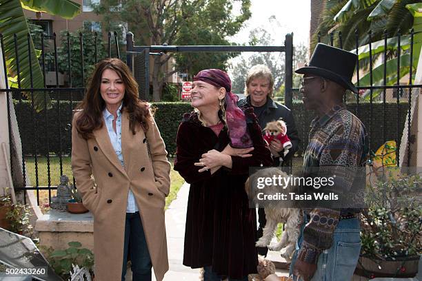 Restaurateurs Lisa Vanderpump and husband Ken Todd deliver holiday meals to Project Angel Food clients on December 24, 2015 in Los Angeles,...