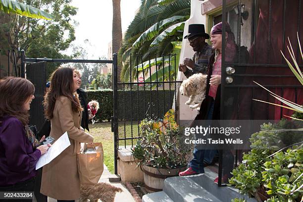 Restaurateurs Lisa Vanderpump and husband Ken Todd deliver holiday meals to Project Angel Food clients on December 24, 2015 in Los Angeles,...