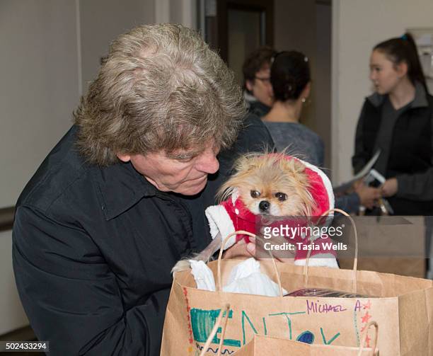 Restaurateur Ken Todd packages holiday meals for delivery to Project Angel Food clients at Project Angel Food on December 24, 2015 in Los Angeles,...