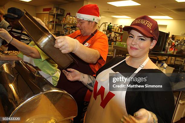 Model Tess Holliday volunteers at Downtown Women's Center on December 24, 2015 in Los Angeles, California.