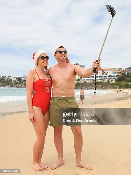 Lauren Lineham and Ryan Lineham from London, England, take a selfie at Bondi Beach on December 25, 2015 in Sydney, Australia. Bondi Beach is a...