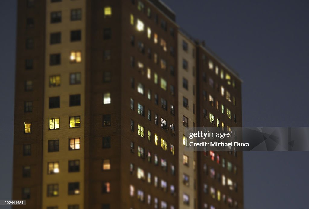 Apartment building at night, selective focus
