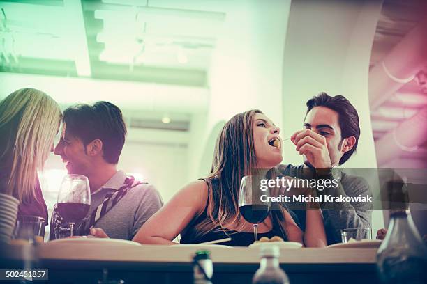 students having fun at night in club - happy hour stockfoto's en -beelden