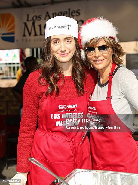 Emmy Rossum and Lisa Rinna are seen at the annual Los Angeles Mission Christmas Dinner on December 24, 2015 in Los Angeles, California.