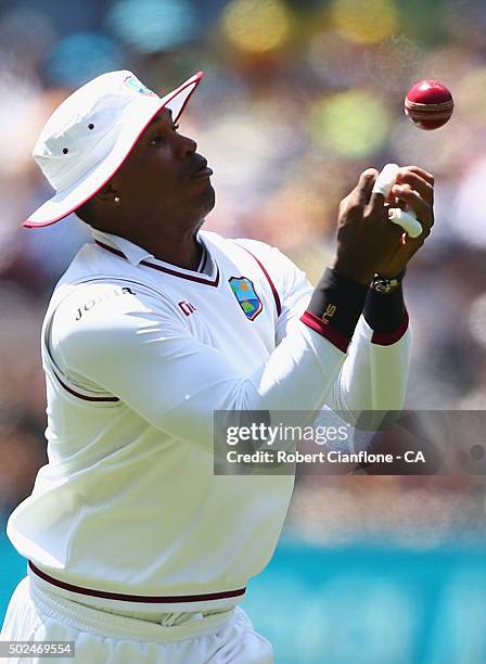 Marlon Samuels of the West Indies takes a catch to dismiss David Warner of Australia during day one of the Second Test match between Australia and...