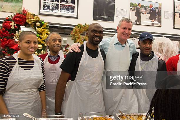 Mayor Bill de Blasio attended the National Action Networks annual Christmas day toy give away & community meal for the hungry. The Mayor & Chiara de...