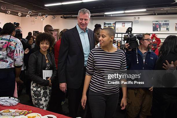 Mayor Bill de Blasio attended the National Action Networks annual Christmas day toy give away & community meal for the hungry. The Mayor & Chiara de...