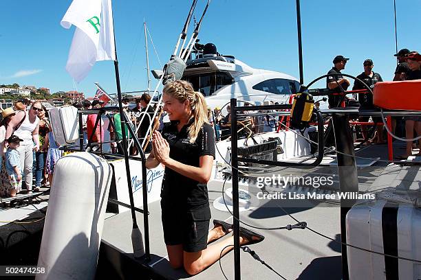 Erin Molan pretends to pray during Perpetual LOYAL's Boxing Day Bon Voyage at Rose Bay Marina on December 26, 2015 in Sydney, Australia.