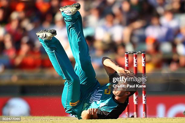 Mark Steketee of the Heat slips after a delivery during the Big Bash League match between the Perth Scorchers and the Brisbane Heat at WACA on...