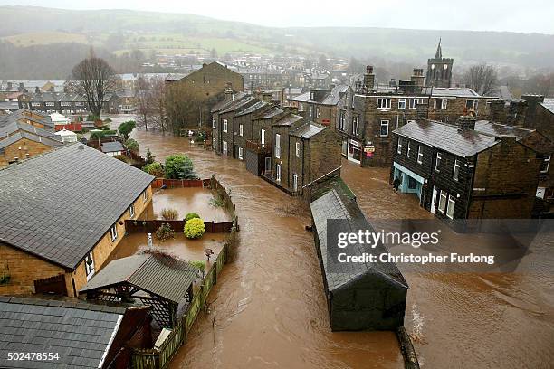 Floodwater rises as the River Calder bursts its bank's in the Calder Valley town of Mytholmroyd on December 26, 2015 in Mytholmroyd, England. There...