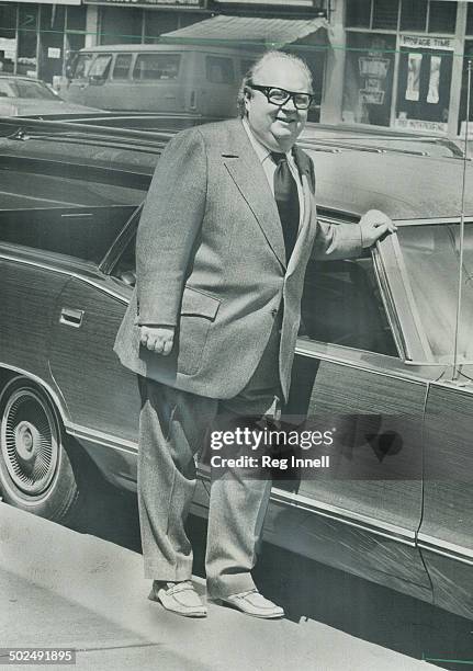 Sam Shopsowitz; hot dog King who takes a size 52; wears Irish twist suit with wide lapels and scalloped prockets. I keep up with new fashion trends;...