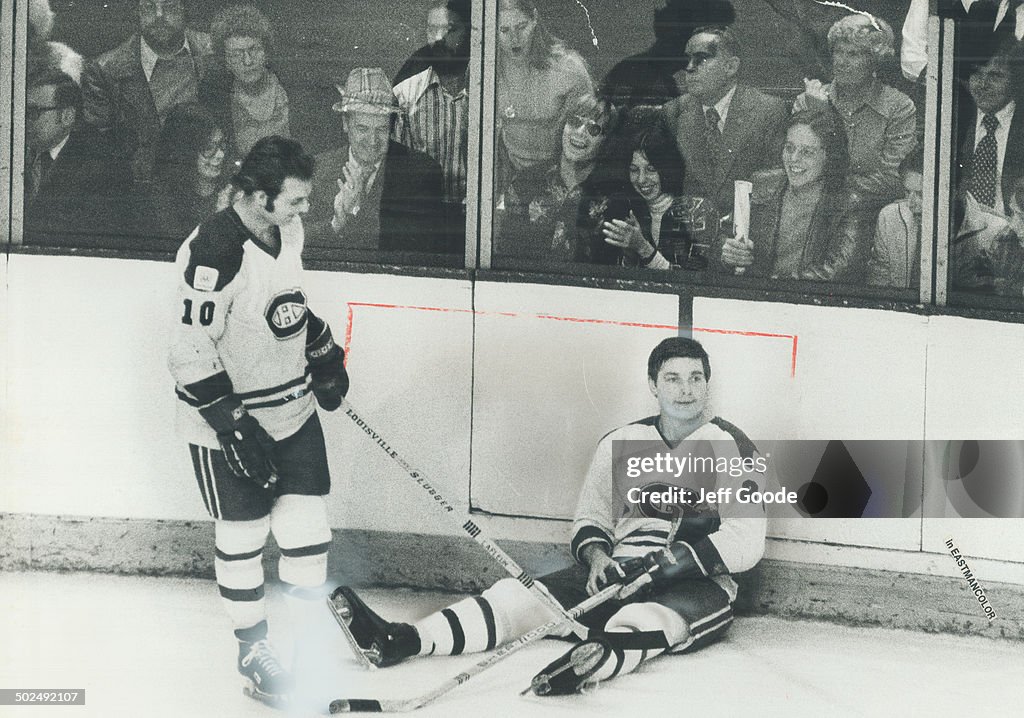 Well-Earned Rest: Peter Mahovlich of Montreal Canadiens sits on ice during break in Montreal-Soviet
