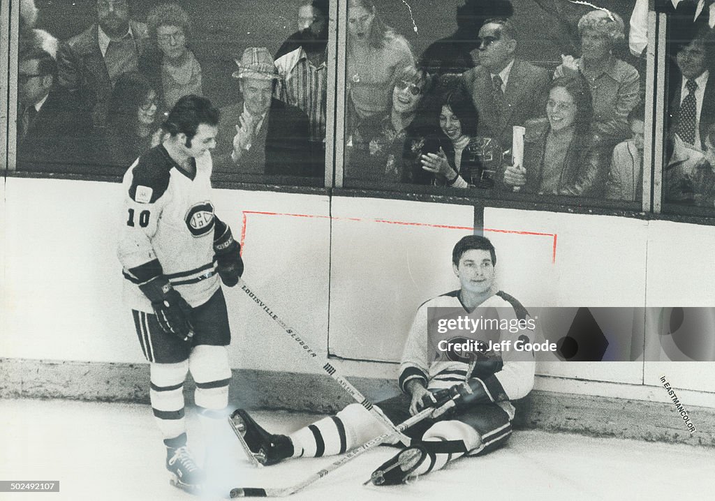 Well-Earned Rest: Peter Mahovlich of Montreal Canadiens sits on ice during break in Montreal-Soviet 