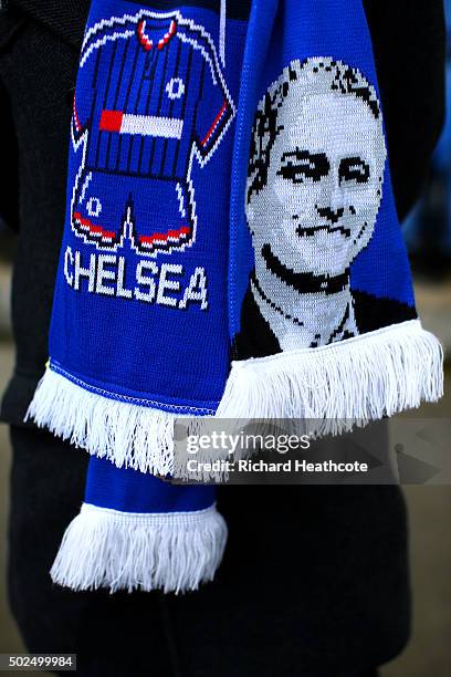 Fan wears a Chelsea scarf with the image of the club's former manager, Jose Mourinho before the Barclays Premier League match between Chelsea and...