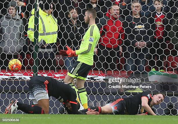 David de Gea, Chris Smalling and Phil Jones of Manchester United react to Marko Arnautovic of Stoke City scoring their second goal during the...