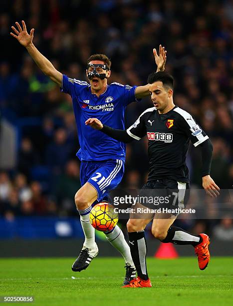 Nemanja Matic of Chelsea appeals as Jose Manuel Jurado of Watford runs through during the Barclays Premier League match between Chelsea and Watford...