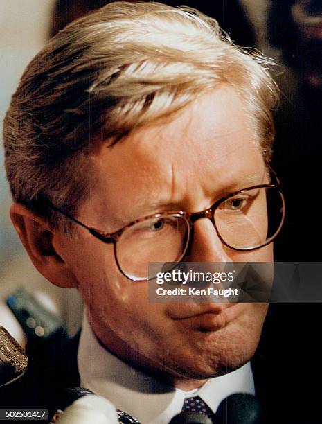 Grim Leader: Premier Bob Rae faces reporters yesterday after cabinet ministers Anne Swarbrick and Shelley Martel offered him their resignations.