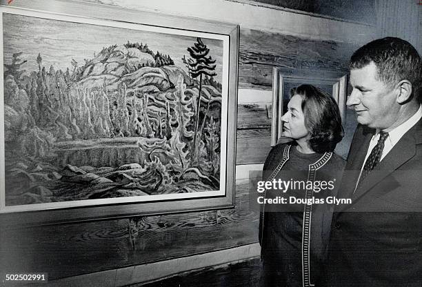 Robert and Signe McMichael with one of their A. Y. Jackson paintings. They've turned their Canadian art collection and 20-acre Kleinburg estate over...