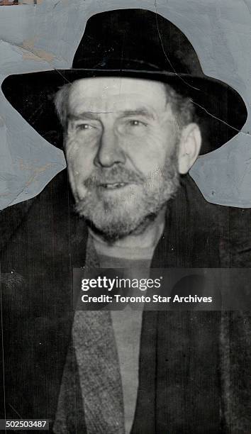 Ezra Pound; bearded 65-year-old poet who is under indictment on a charge of treason; was flown to Washington from Europe to face trial. He pauses...