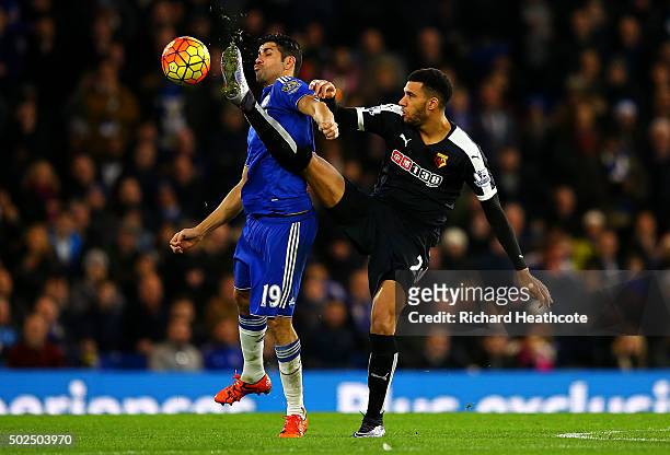 Etienne Capoue of Watford battles for the ball with Diego Costa of Chelsea during the Barclays Premier League match between Chelsea and Watford at...