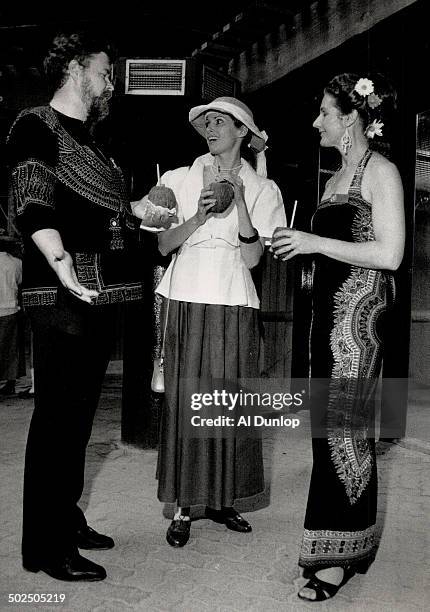 Above; Peter Mehren in an embroidered shirt from Nairobi; Elaine Munro in a Clotheslines outfit; and Dr. Kay Mehren in a taifa cloth dress that also...