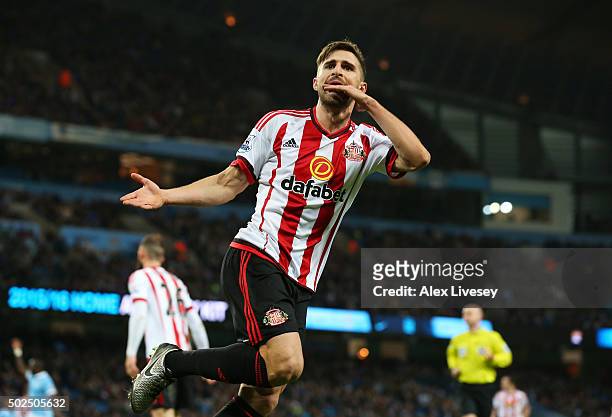 Fabio Borini of Sunderland celebrates after scoring his team's first goal during the Barclays Premier League match between Manchester City and...