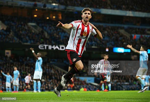 Fabio Borini of Sunderland celebrates after scoring his team's first goal during the Barclays Premier League match between Manchester City and...