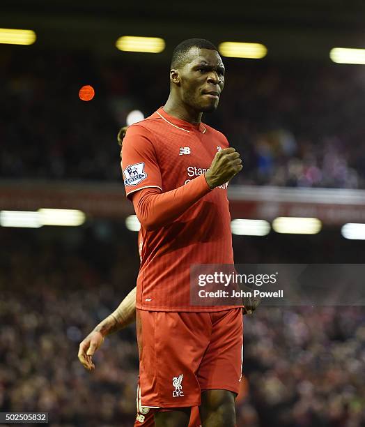 Christian Benteke of Liverpool celebrates his goal during the Barclays Premier League match between Liverpool and Leicester City at Anfield on...