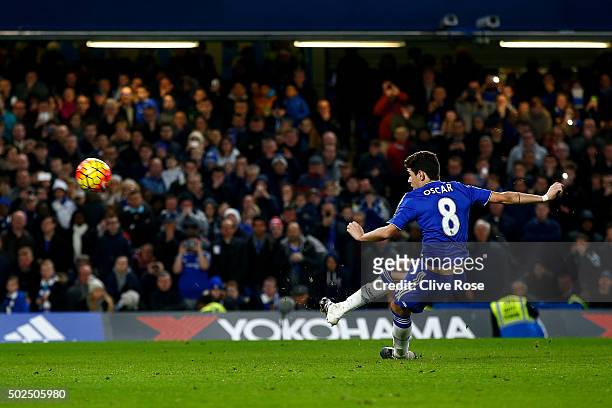 Oscar of Chelsea watches the ball fly over the bar as he slips taking a penalty during the Barclays Premier League match between Chelsea and Watford...