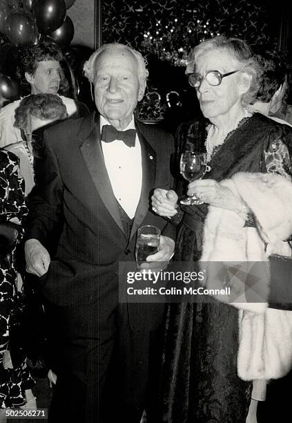 Former governor-general Roland Michener with Mary Jackman; Nancy Rowell Jackman's mother; wearing a black lace dress and pale mink stole.