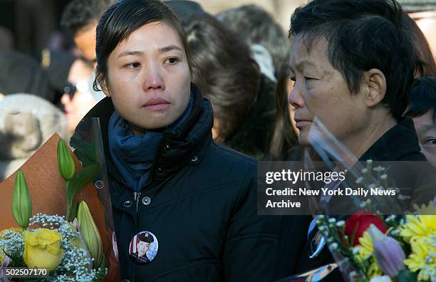 Memorial was held at the 84th Precinct in Brooklyn for Police Officers Rafael Ramos and Wenjian Liu slain last year by a lone gunman on Tompkins...